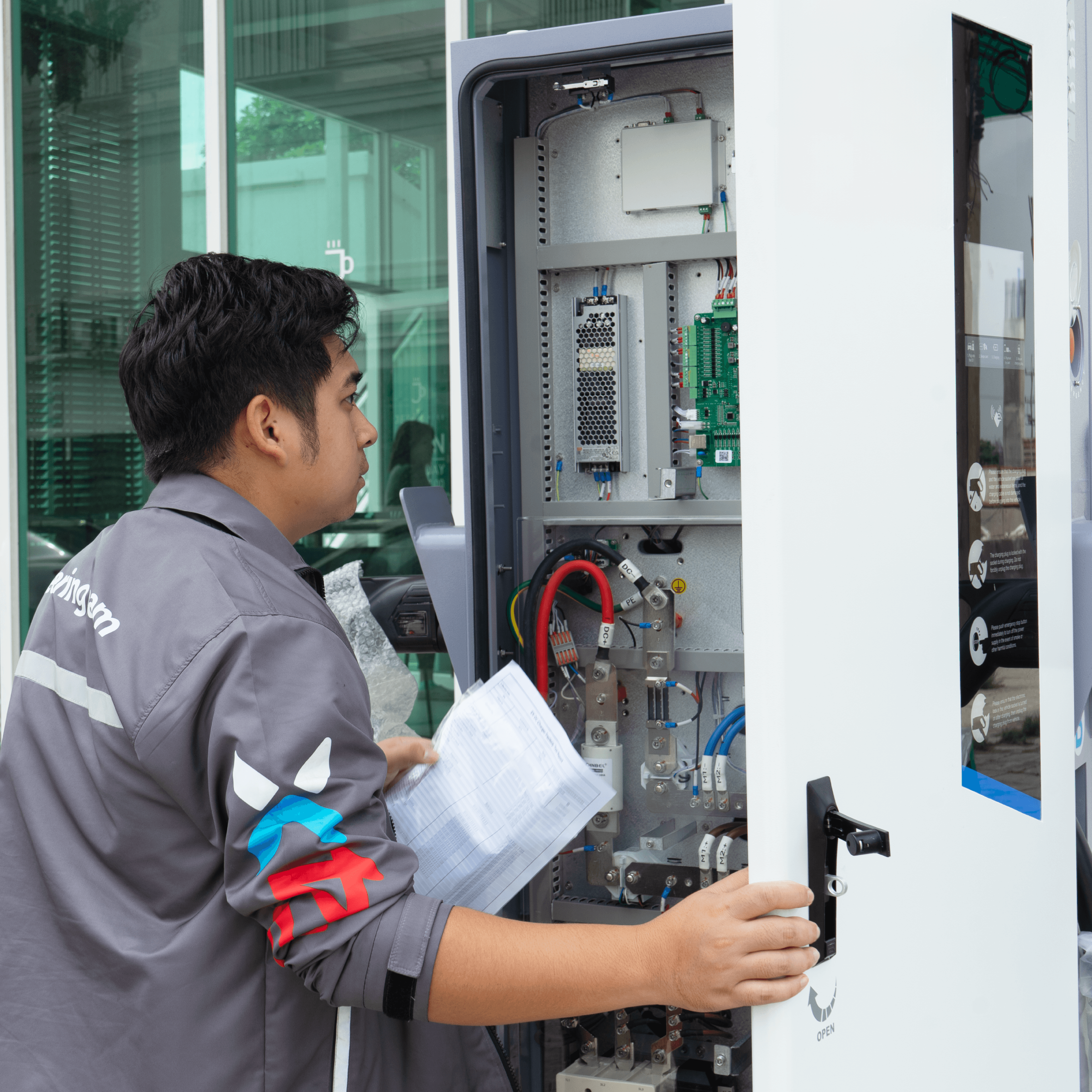 Engineer inspecting electrical equipment