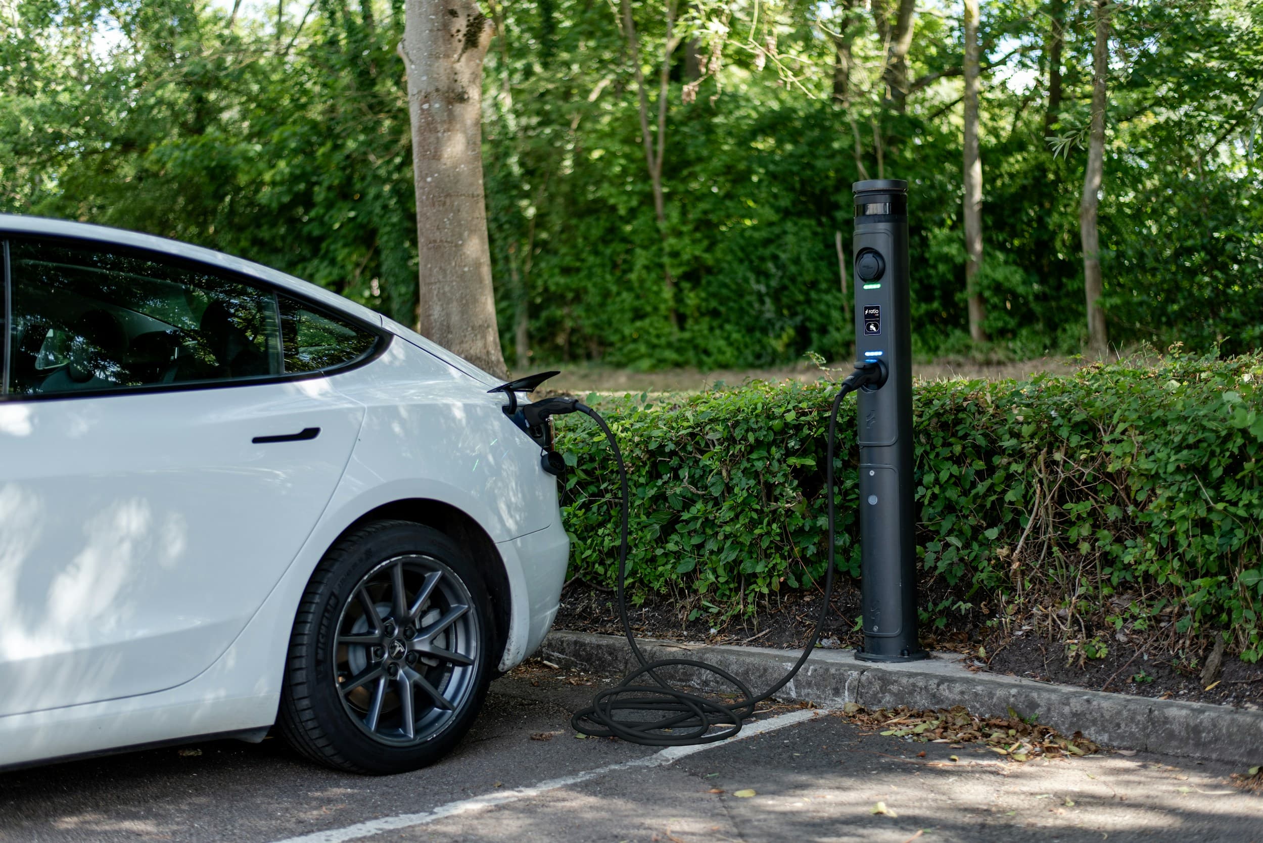 An electric car charging at a Verte charging point